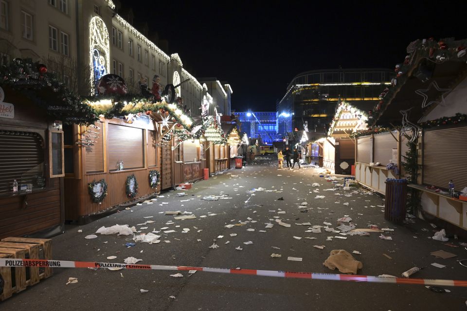 The cordoned-off Christmas market in Magdeburg (Heiko Rebsch/dpa via AP)