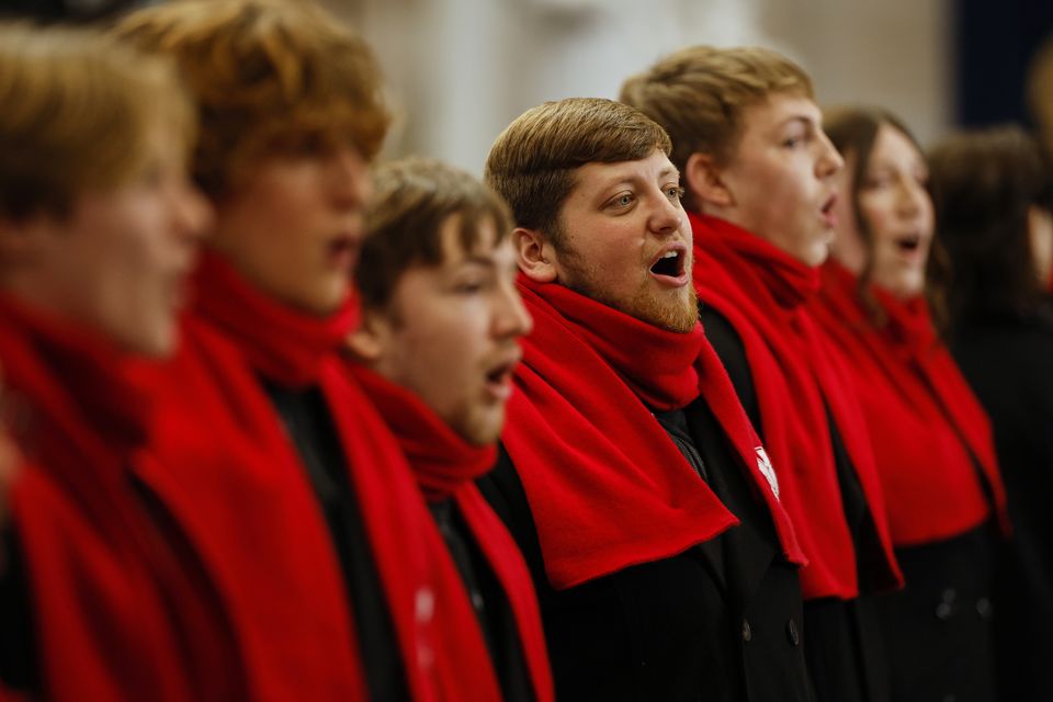 Choir students from the University of Nebraska-Lincoln practice before the 60th Presidential Inauguration (Chip Somodevilla/Pool Photo via AP)