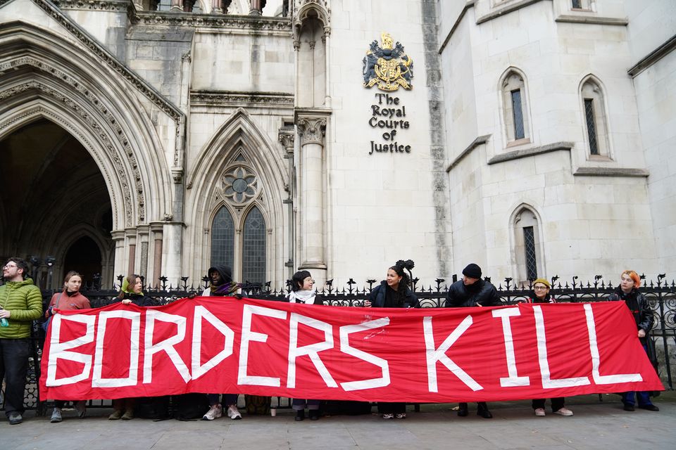 Protesters outside the the Royal Courts Of Justice in London for Wednesday’s hearing (Ben Whitley/PA)