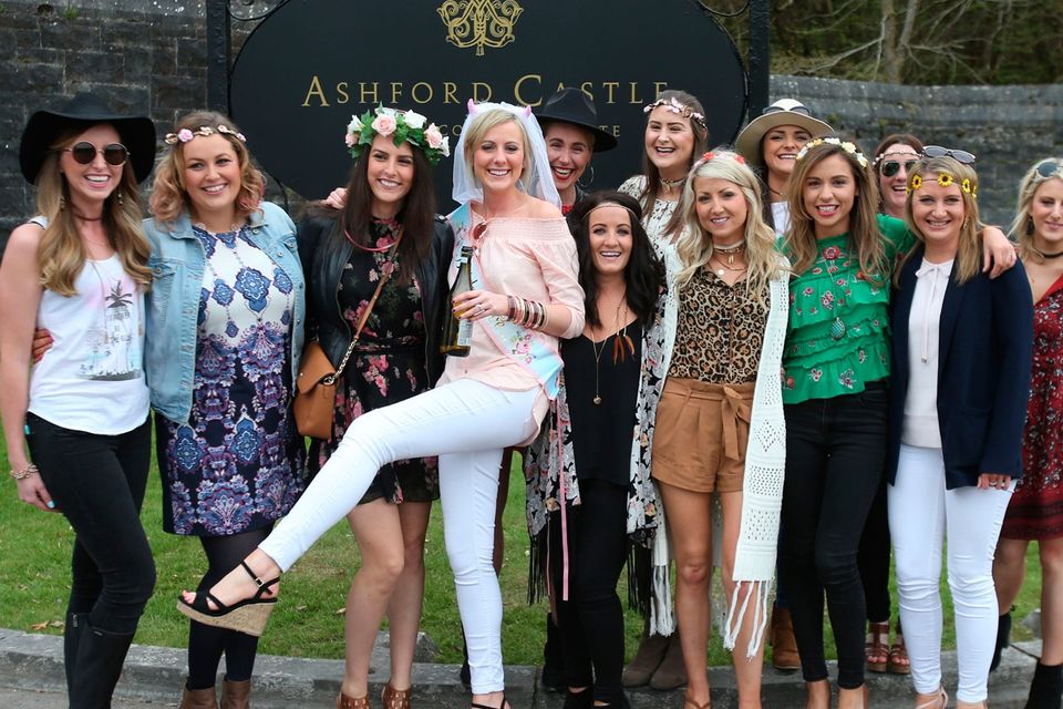 Bride to be Aoife Power (centre ) stops with her hen party outside Ashford Castle in Co Mayo. Pic Niall Carson/PA Wire