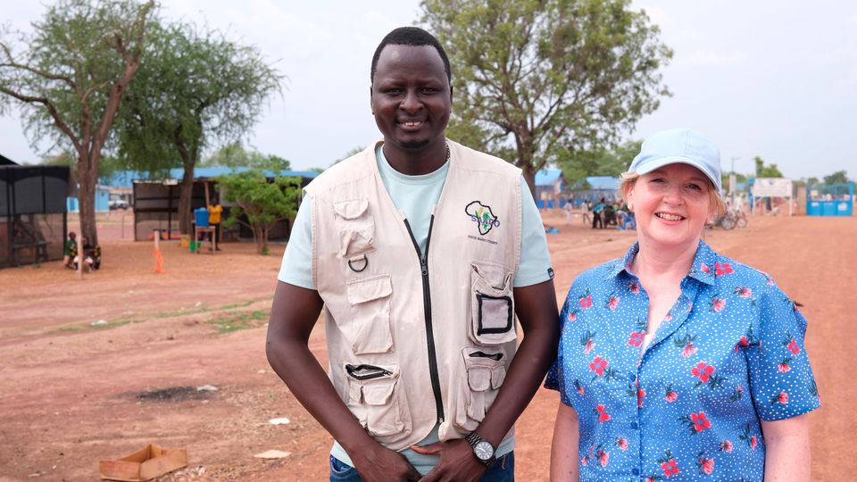 Elijah Manyok, CEO of SAADO, with Rosamond Bennett, Chief Executive of Christian Aid Ireland, at Wedweil refugee camp in South Sudan. Credit: Katie Cox