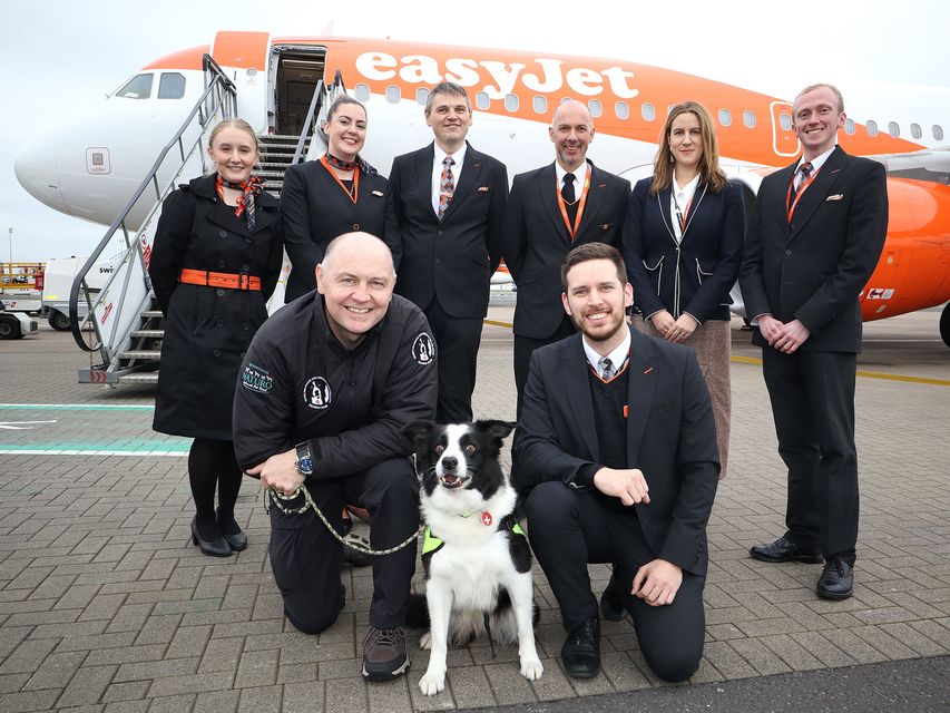 Search And Rescue Dog Association Ireland North (SARDA IN) representatives with EasyJet staff