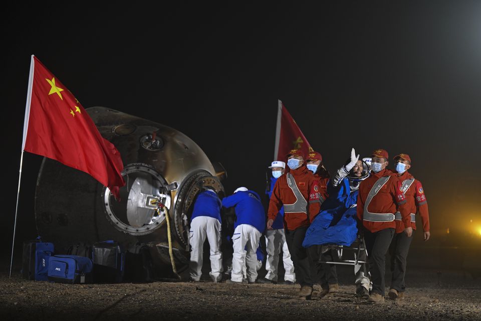 The three had been on board Tiangong space station (Lian Zhen/Xinhua via AP)