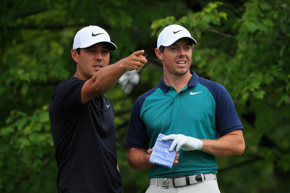 Rory McIlroy (right) has backed caddie Harry Diamond once again ahead of next week's US Open. (Photo by Jamie Squire/Getty Images)
