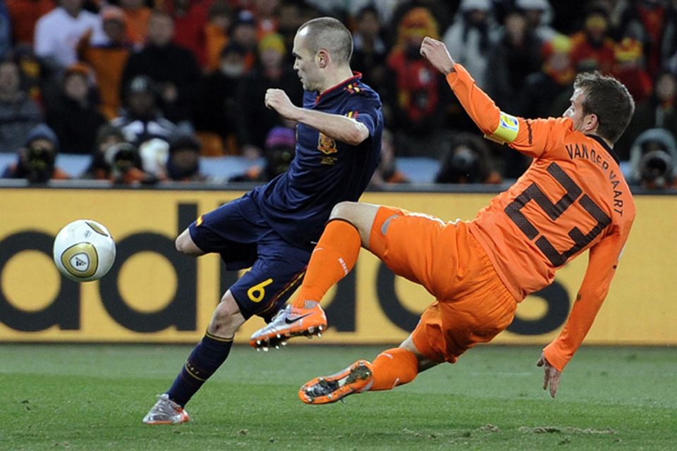 Gregory van der Wiel of the Netherlands controls the ball during the 2010  FIFA World Cup final match between the Netherlands and Spain at the Soccer  City Stadium in Johannesburg, South Africa