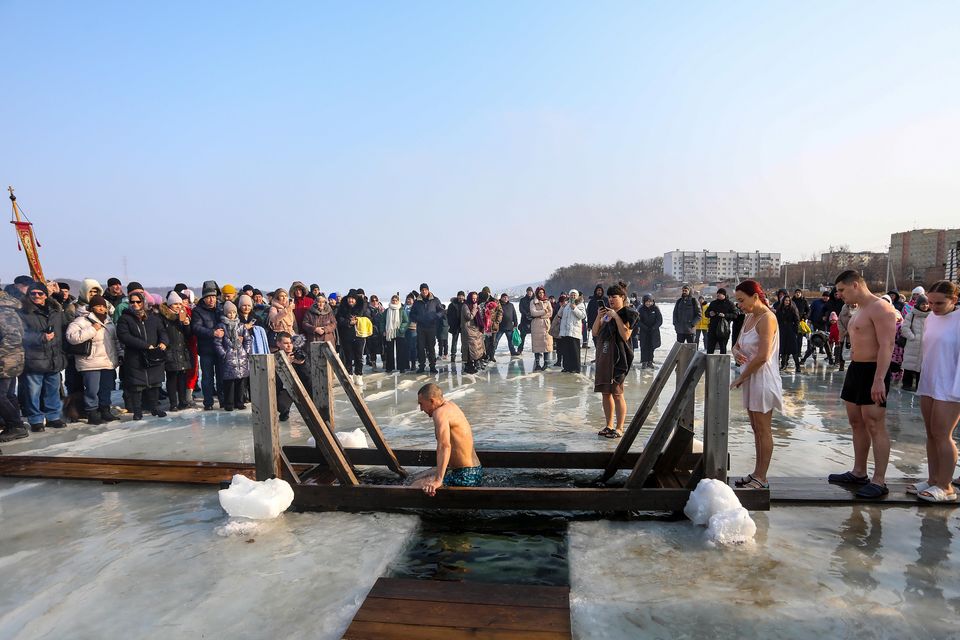 People line up to plunge in icy water in the Russian far east port Vladivostok (AP)