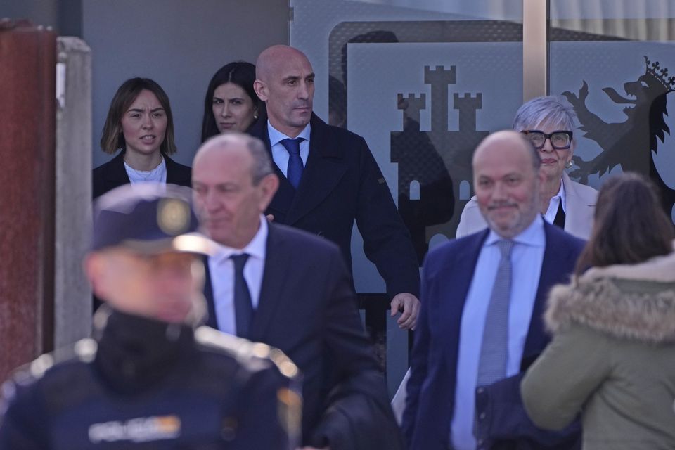 The former president of Spain’s soccer federation Luis Rubiales, top, leaves a court on the outskirts of Madrid (Manu Fernandez/AP)