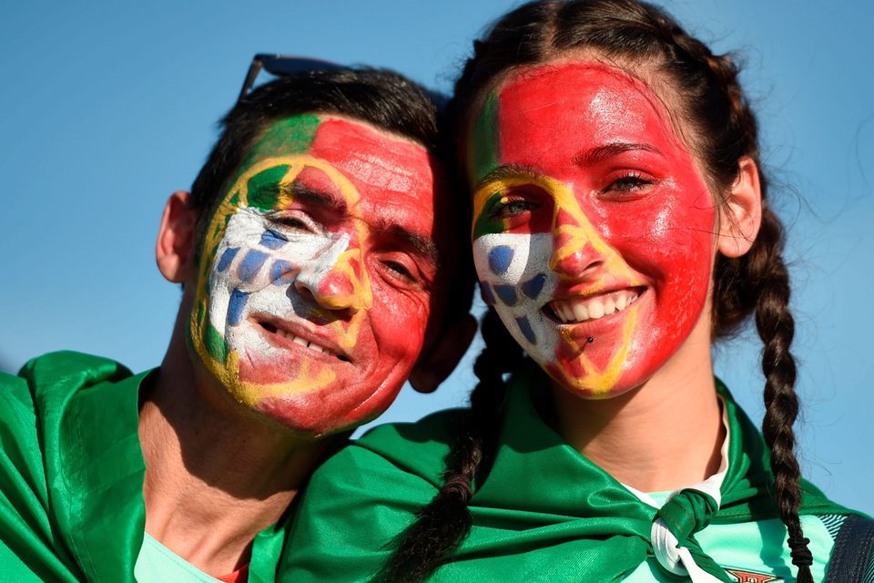 The beautiful game - football fans from around the world - Portugal supporters before the UEFA Euro 2016, semi-final match at the Stade de Lyon, Lyon. PA