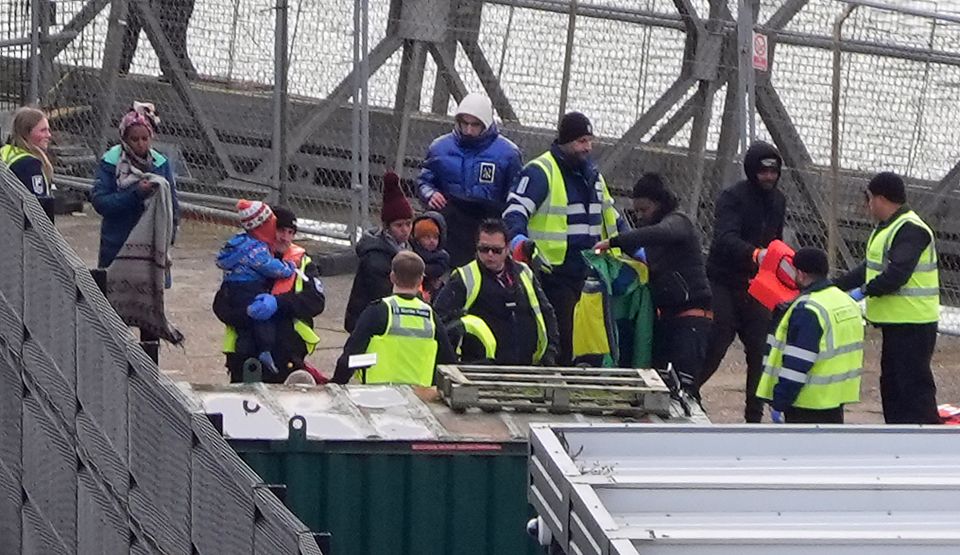 A group of people thought to be migrants are brought in to Dover, Kent, from a Border Force vessel (Gareth Fuller/PA)