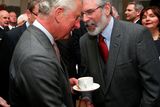 thumbnail: Prince Charles shakes hands with Sinn Fein president Gerry Adams at the National University of Ireland on May 19, 2015 in Galway (Photo by Brian Lawless - WPA Pool/Getty Images)