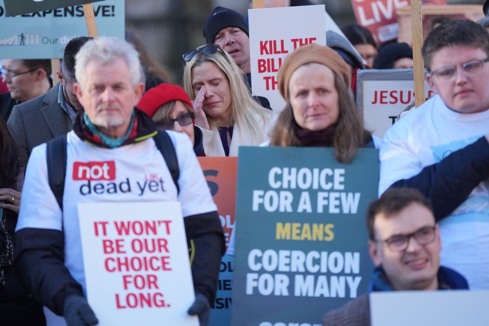 People take part in a demonstration at Old Palace Yard in Westminster, London, to oppose the Terminally Ill Adults (End of Life) Bill. A proposed law to legalise assisted dying in England (Yui Mok/PA)