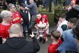 thumbnail: Cliftonville fans get a chance to have their picture taken with the Irish Cup after Cliftonville players arriveed at the Devinish bar on an open top bus to meets supporters, Monday, May 6, 2024.  Picture by Peter Morrison