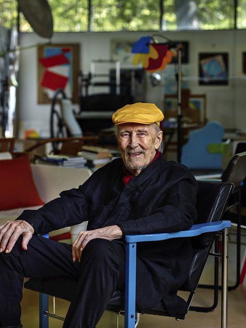 Yrjo Kukkapuro sitting in his famous Experiment chair in his studio outside Helsinki (Studio Kukkapuro via AP)