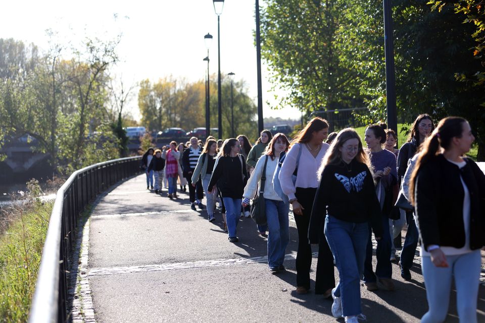 Members of Walkie Talkie Girlies society take part in their regular organised walk through Belfast (Picture by Peter Morrison)