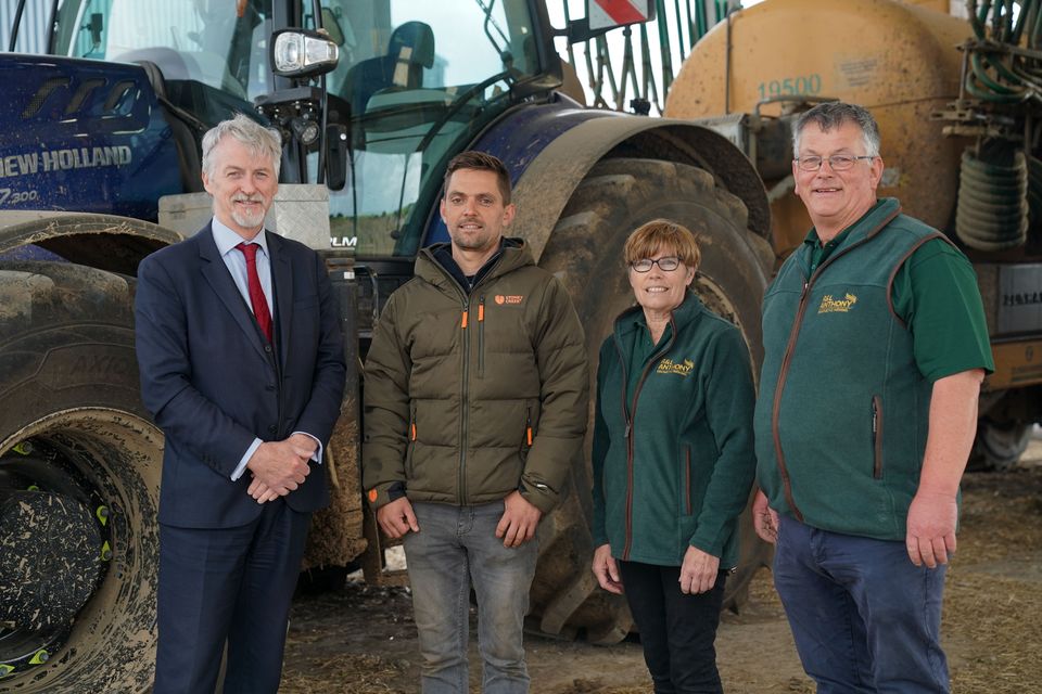 Climate Change and Rural Affairs Secretary Huw Irranca-Davies (left) with staff at Sealands Farm in Bridgend (Welsh Government/PA)