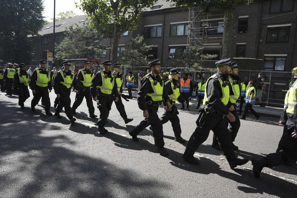 Police at the carnival (Jeff Moore/PA)