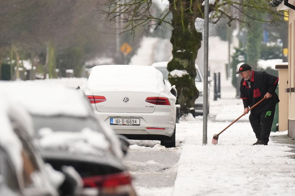 Weather warnings are continuing into Wednesday in some areas (Niall Carson/PA)