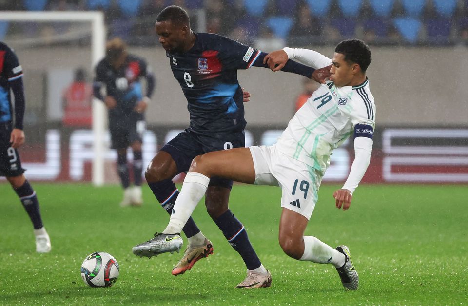 Northern Ireland’s Shea Charles with Luxembourg’s Christopher Martins