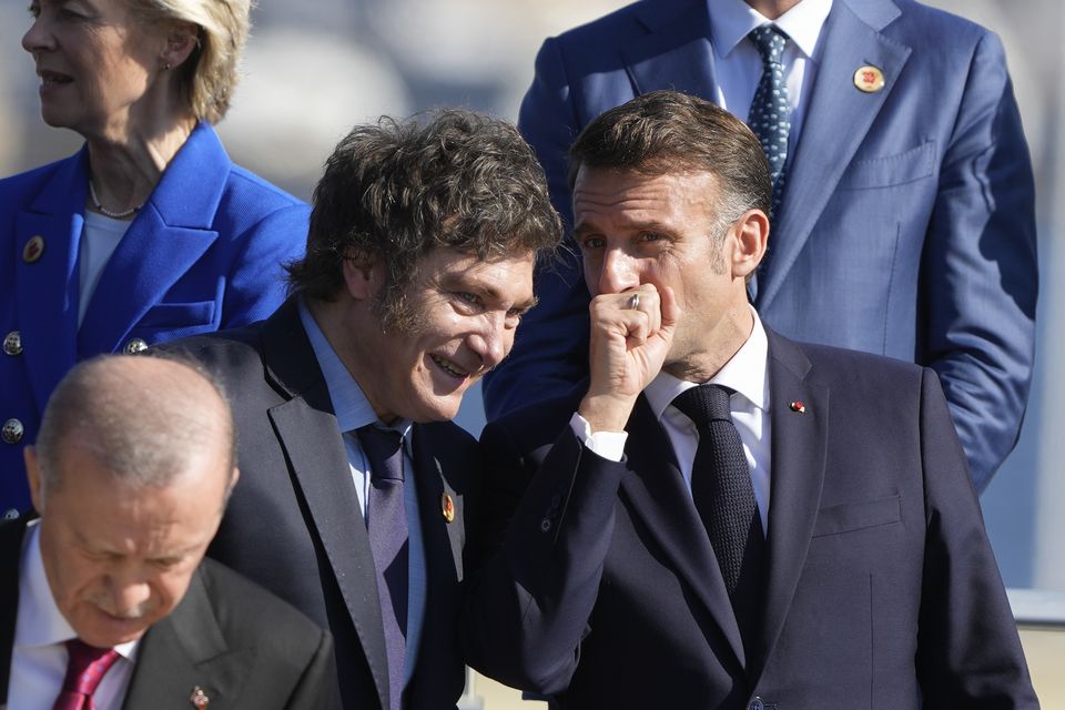 Argentina’s President Javier Milei, with France’s President Emmanuel Macron, has been opposed to some of Brazil’s declaration (AP Photo/Eraldo Peres)