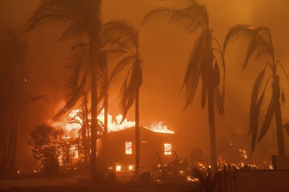 FILE – A home burns in the Eaton Fire in Altadena, California on January 8 (Nic Coury/AP, File)