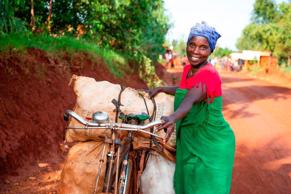 One of those supported by Christian Aid’s local partner in Burundi is Aline Nibogora. With the profits she made selling her avocados and peanuts, Aline bought a bicycle to transport her goods further afield. Credit: Christian Aid/Ndacayisaba Epitace