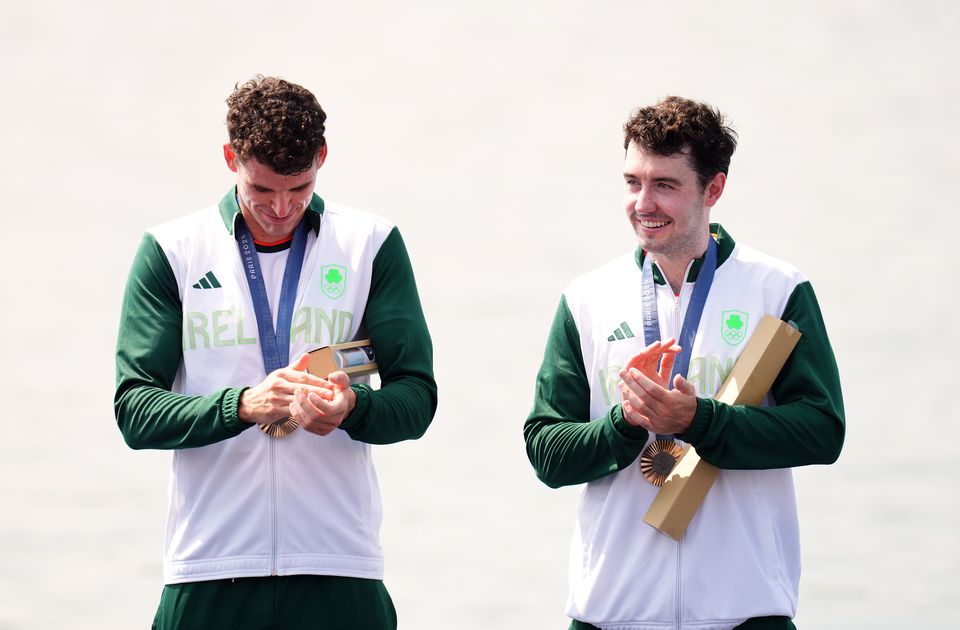 Ireland’s Daire Lynch and Philip Doyle receive their bronze medals for the Men’s Rowing Double Sculls (John Walton/PA)