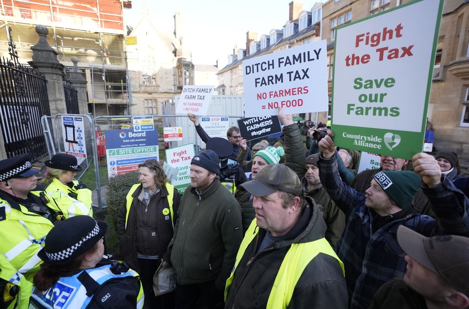 Farmers make their point outside the Oxford Farming Conference at The Examination Schools, Oxford (Andrew Matthews/PA)