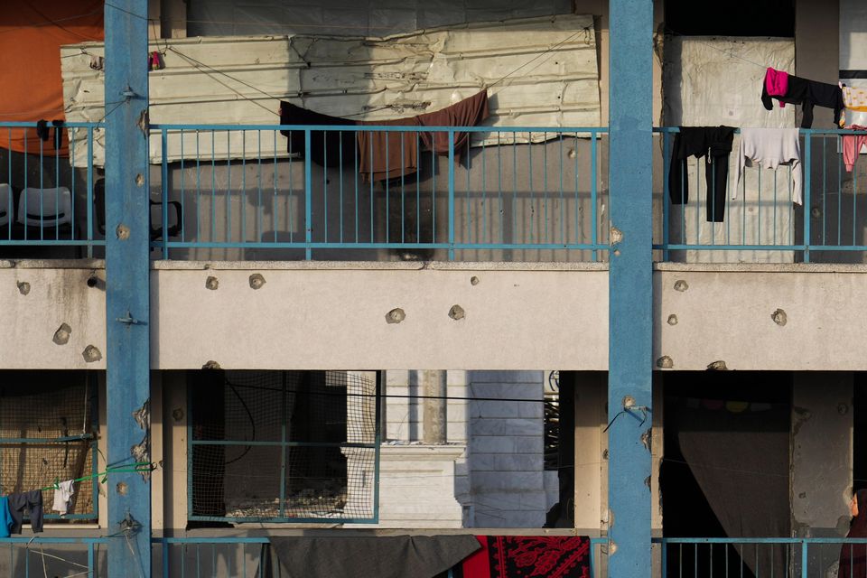 Displaced Palestinians live in a school run by UNRWA, the UN agency helping Palestinian refugees, west of Gaza City (Jehad Alshrafi/AP)