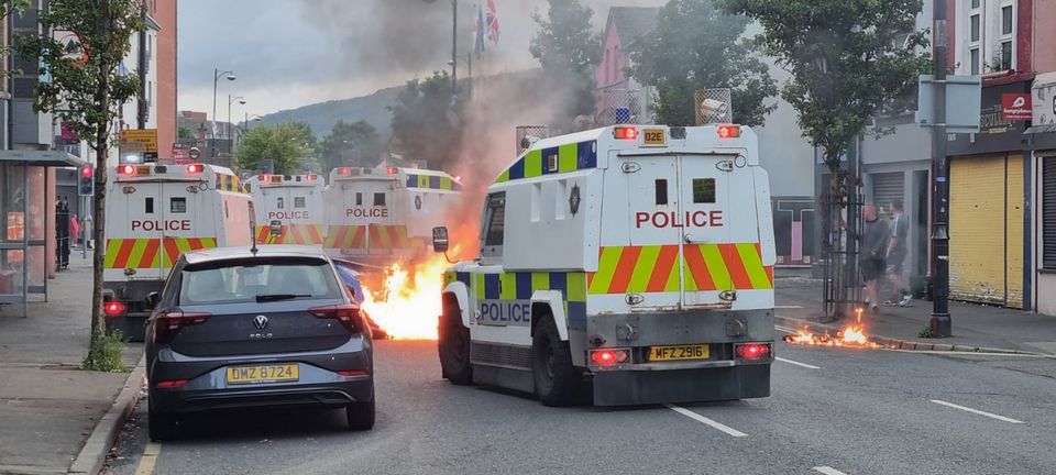 PSNI officers man road blocks in Belfast following an anti-Islamic protest outside Belfast City Hall (PA)