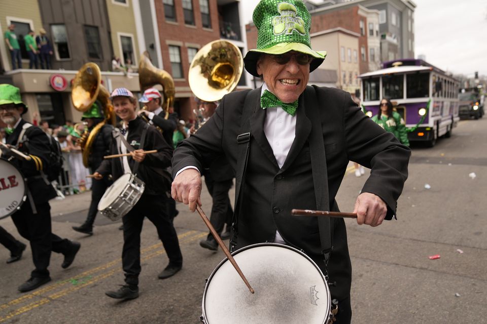 A drummer performs during the parade in Boston (Robert F Bukaty/AP)