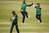 thumbnail: Graham Hume of Ireland celebrates with Curtis Campher after taking the wicket of Pakistan’s Babar Azam