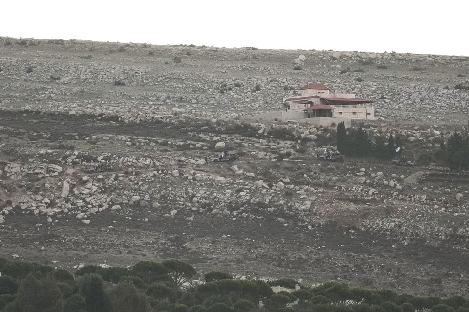 Israeli army vehicles park near the so-called Alpha Line that separates the Israeli-annexed Golan Heights from Syria (Matias Delacroix/AP)