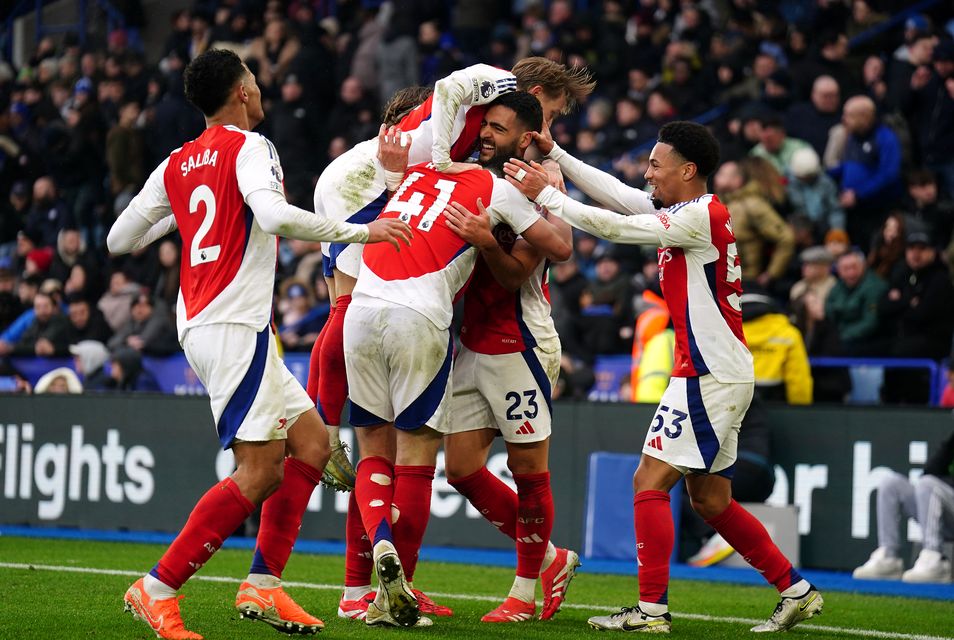 Celebration time as the Arsenal players celebrate Mikel Merino’s second goal at Leicester (PA)