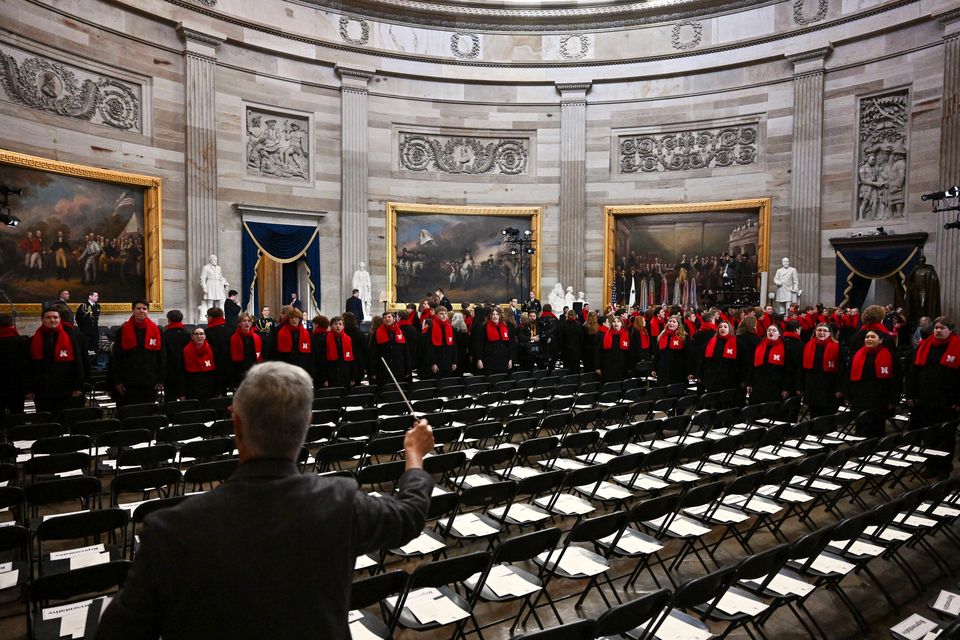 Choir students practice before inauguration (Ricky Carioti/The Washington Post via AP, Pool)