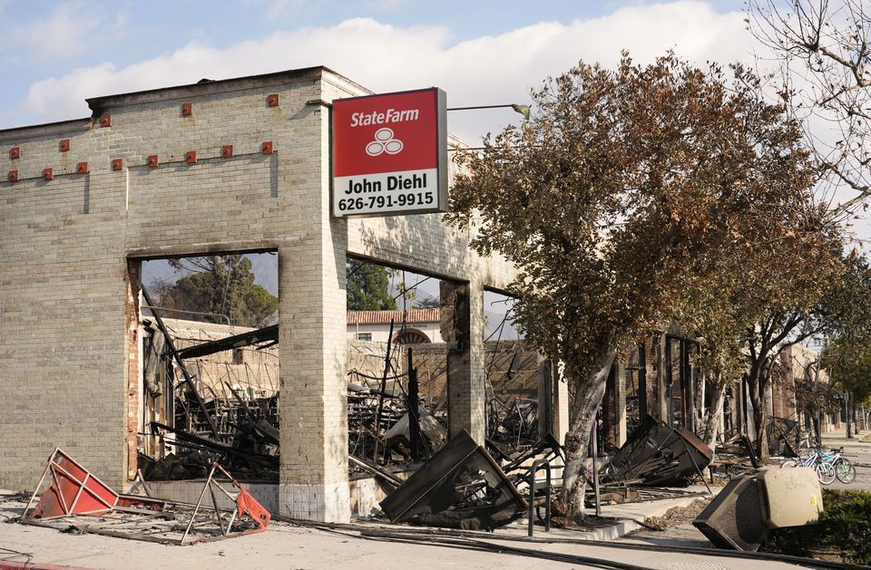 Thousands of homes and business premises have been destroyed in the fires (Chris Pizzello/AP)