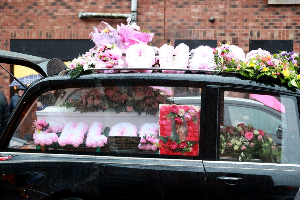 The hearse carrying the coffin of Chloe Ferris arrives at St Paul’s Church in Belfast (Liam McBurney/PA)