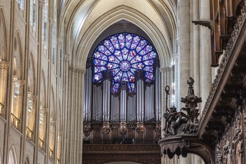 The stained glass rose window and the great organ have been fully restored (Pool via AP)