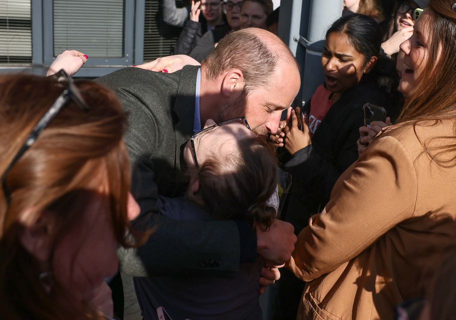 The Prince of Wales hugs well-wisher Natasha Gorry during his visit to Bournemouth and Poole College (Jack Taylor/PA)