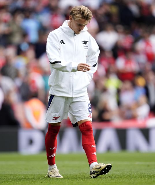 Arsenal will be without Martin Odegaard shows his dejection after the Premier League match at the Emirates Stadium, London. Picture date: Saturday August 31, 2024.