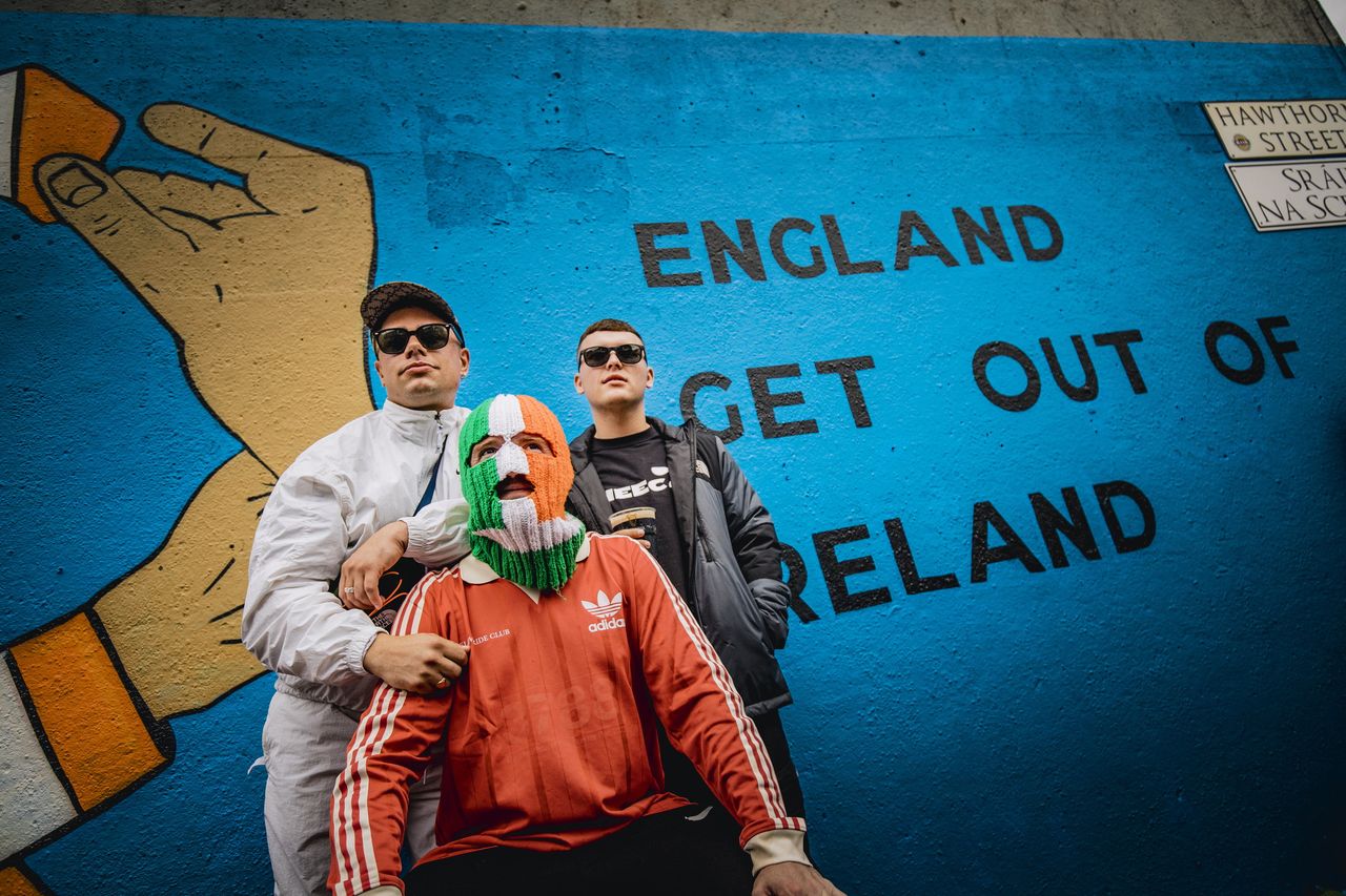 West Belfast: Irish Language Hip Hop Band Kneecap Unveil New Mural ...