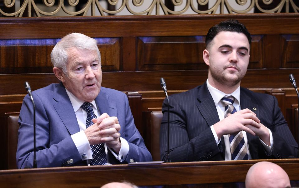 Independent TDs Michael Lowry and Barry Heneghan in the Dail chamber ahead of the vote on the nomination of Micheal Martin as Taoiseach (Fergal Phillips/Maxwells/PA)