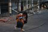 thumbnail: Picture taken in Manta, Ecuador, on April 17, 2016 a day after a powerful 7.8-magnitude quake hit the country.
The toll from the big earthquake in Ecuador rose on Sunday to 246 dead and 2,527 people injured, the country's vice president said. / AFP PHOTO / LUIS ACOSTALUIS ACOSTA/AFP/Getty Images
