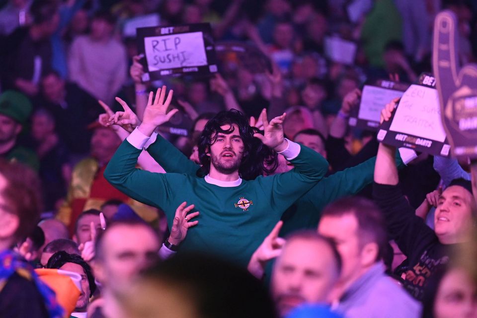 A fan dressed as George Best (Pic: Michael Cooper)