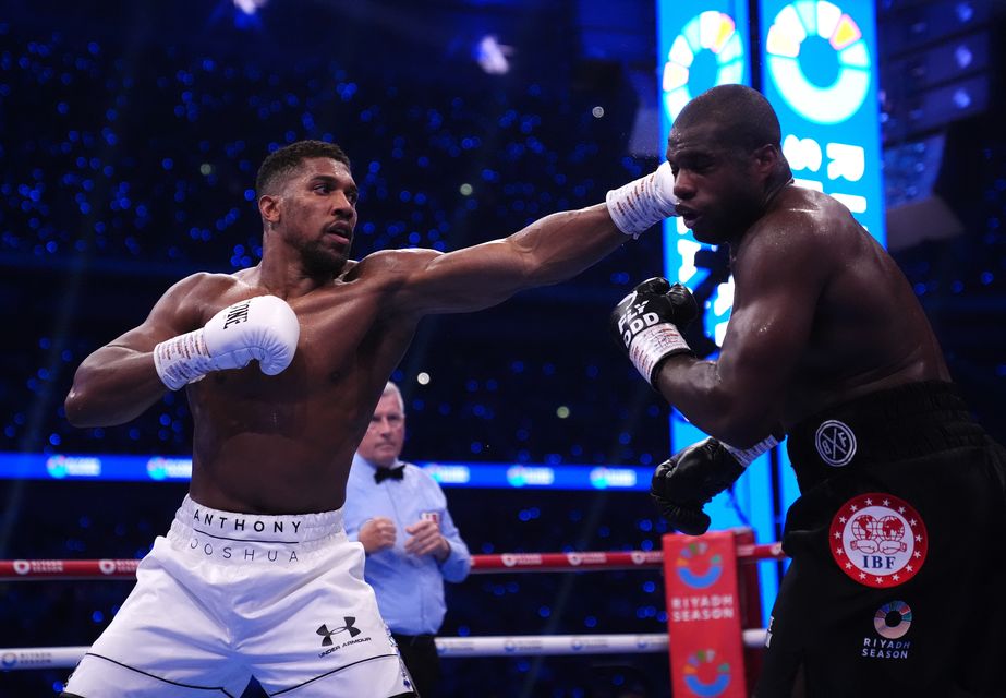 Anthony Joshua (left) could face Deontay Wilder if Fury does not return (Bradley Collyer/PA)