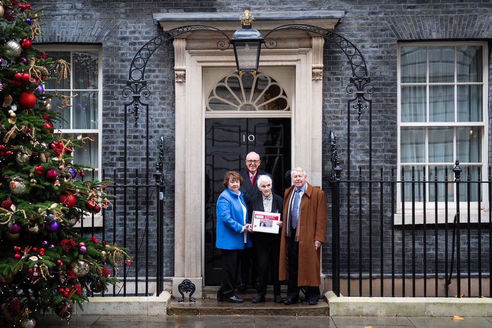 Anne Puckridge, centre, outside Number 10 with her family