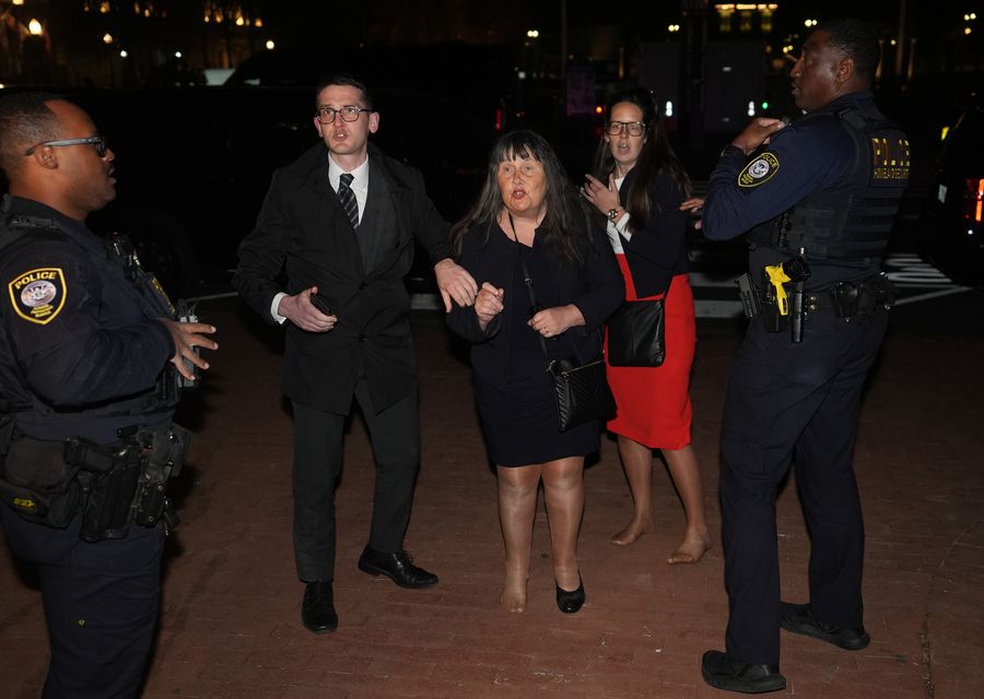 Members of Enoch Burke’s family outside the National Building Museum after being ejected (Niall Carson/PA)