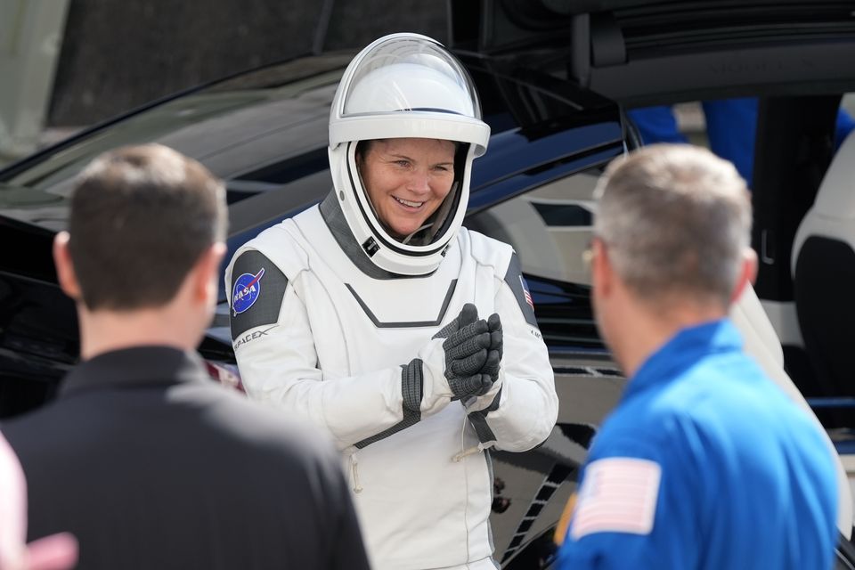 Astronaut Anne McClain greets friends and family before lift off (John Raoux/AP)