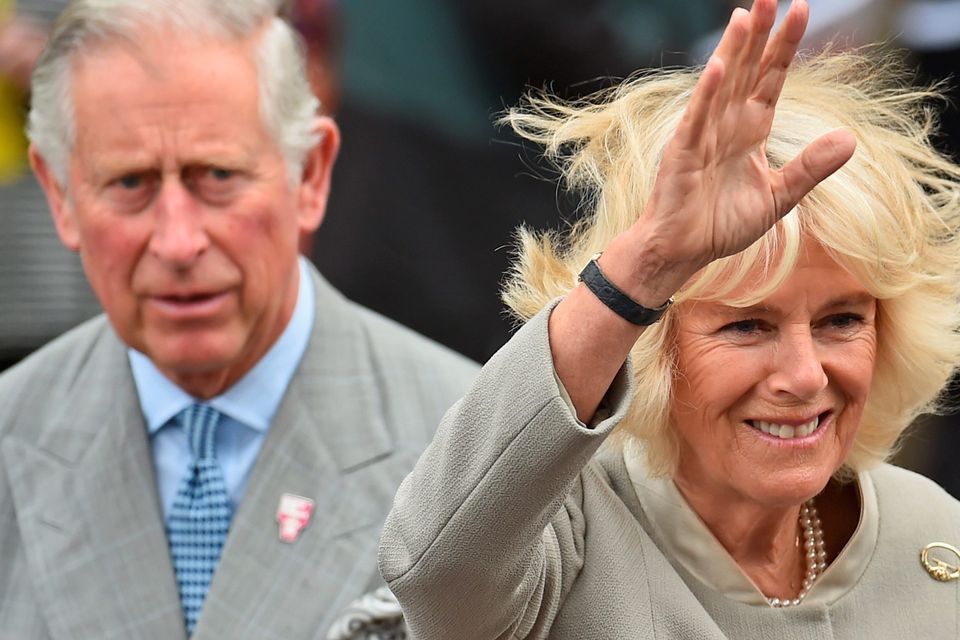 The Prince of Wales and the Duchess of Cornwall, during a visit to St Patrick's Church, in Belfast, Northern Ireland, as the Prince of Wales and the Duchess of Cornwall, attend a series of engagements in Northern Ireland following their two day visit in the Republic of Ireland. PRESS ASSOCIATION Photo. Picture date: Thursday May 21, 2015. The Prince of Wales has visited a Catholic church in Belfast that has been at the centre of a series of bitter marching disputes involving Protestant loyal orders and loyalist bands. St Patrick's Church has witnessed disorder and discord in recent years, with some parading loyalist bandsmen accused of provocative and sectarian behaviour while passing the place of worship. The visit of the prince and the Duchess of Cornwall will be seen as another symbolic gesture by a Royal family keen to contribute to reconciliation in Northern Ireland.
See PA story ROYAL Ireland. Photo credit should read: Jeff J Mitchell/PA Wire