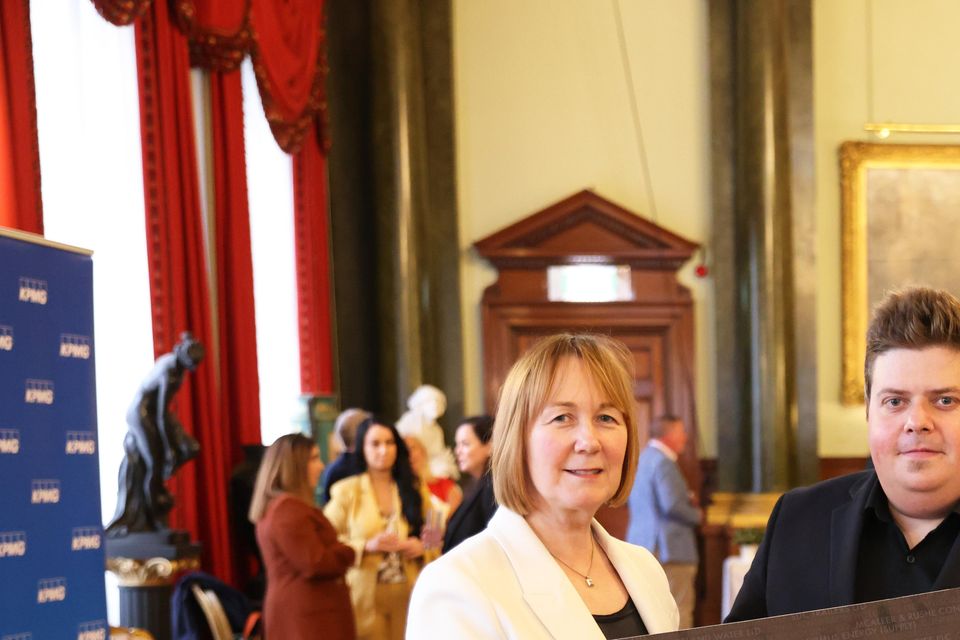 Julie Thompson, KPMG with Ulster Business's John Mulgrew and Judith Martin