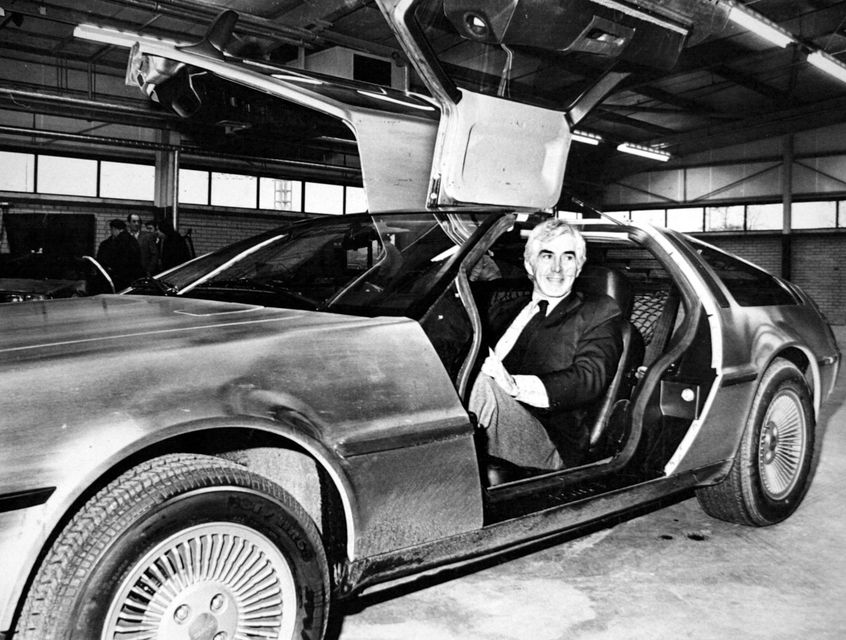 Motorcars:DeLorean/Car designer John DeLorean in one of his gull-winged models.